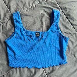 Medium SHEIN crop top in blue. Only worn a few times. Great condition.